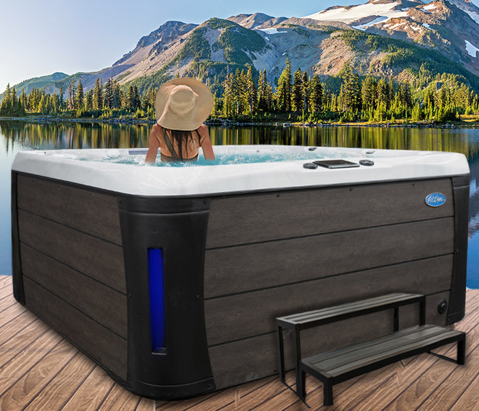 Calspas hot tub being used in a family setting - hot tubs spas for sale Komoka
